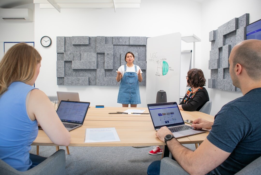 confident woman presenting in meeting